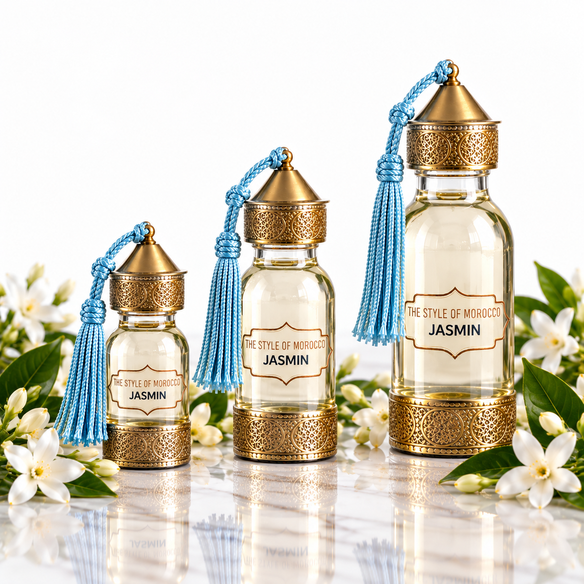 Set van drie geurolieflessen Thé Vert in 30 ml, 60 ml en 125 ml op lichte studio-achtergrond