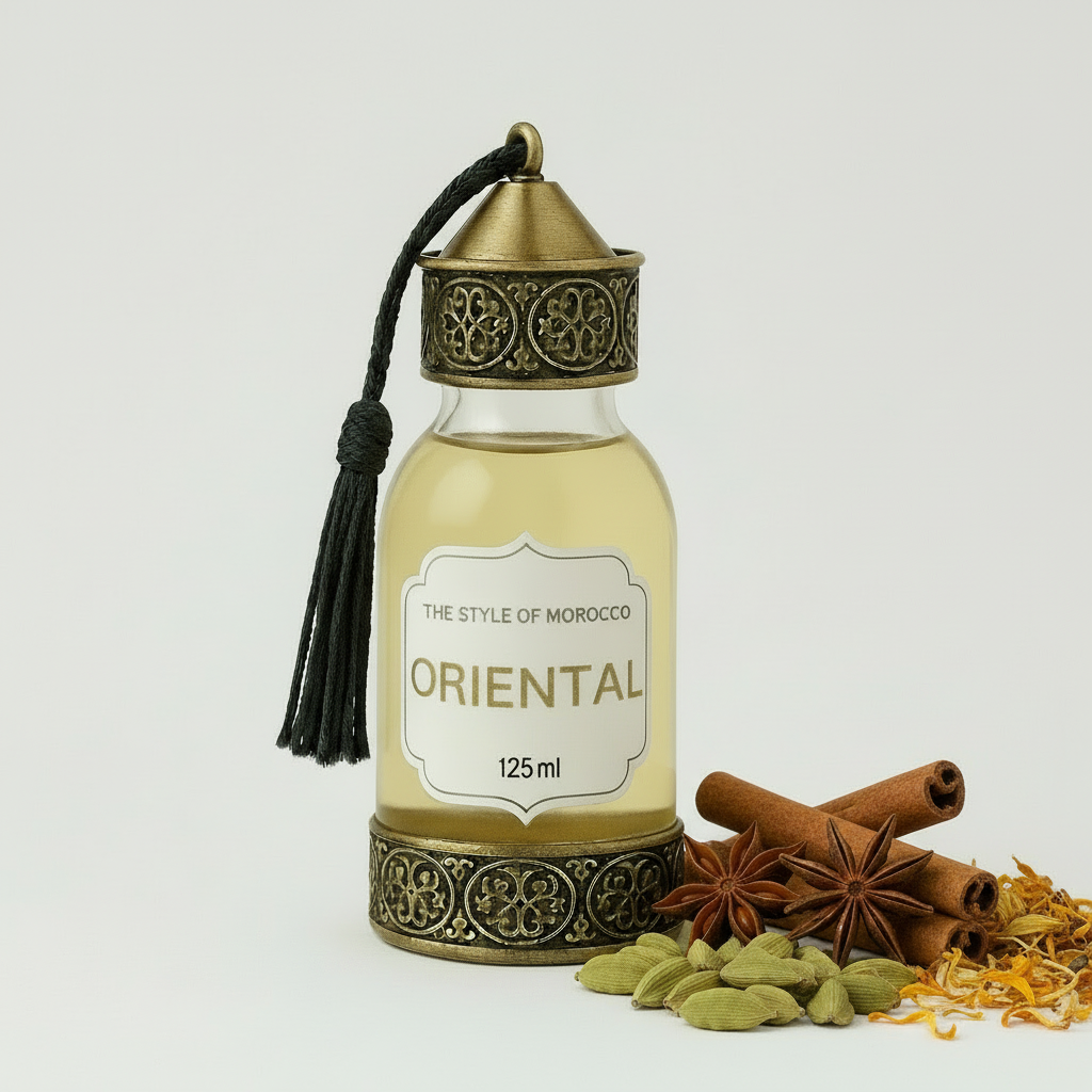 Flesje Oriental Essentiële Olie met luxe verpakking, omgeven door Marokkaanse kruiden en hout.